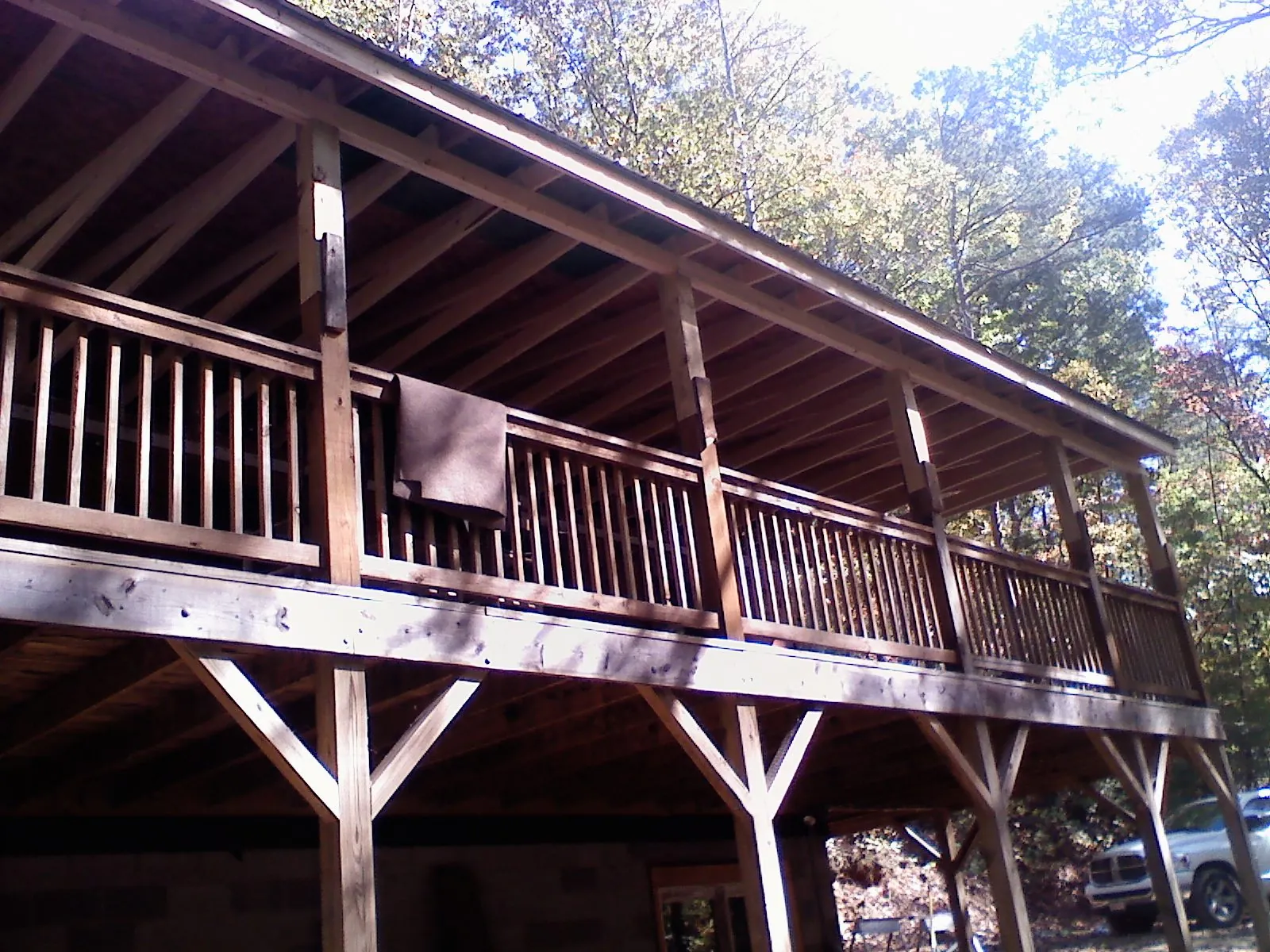 Timber framing under a new elevated porch and deck — Roof Leak Repair in Naperville by Roofing Brothers